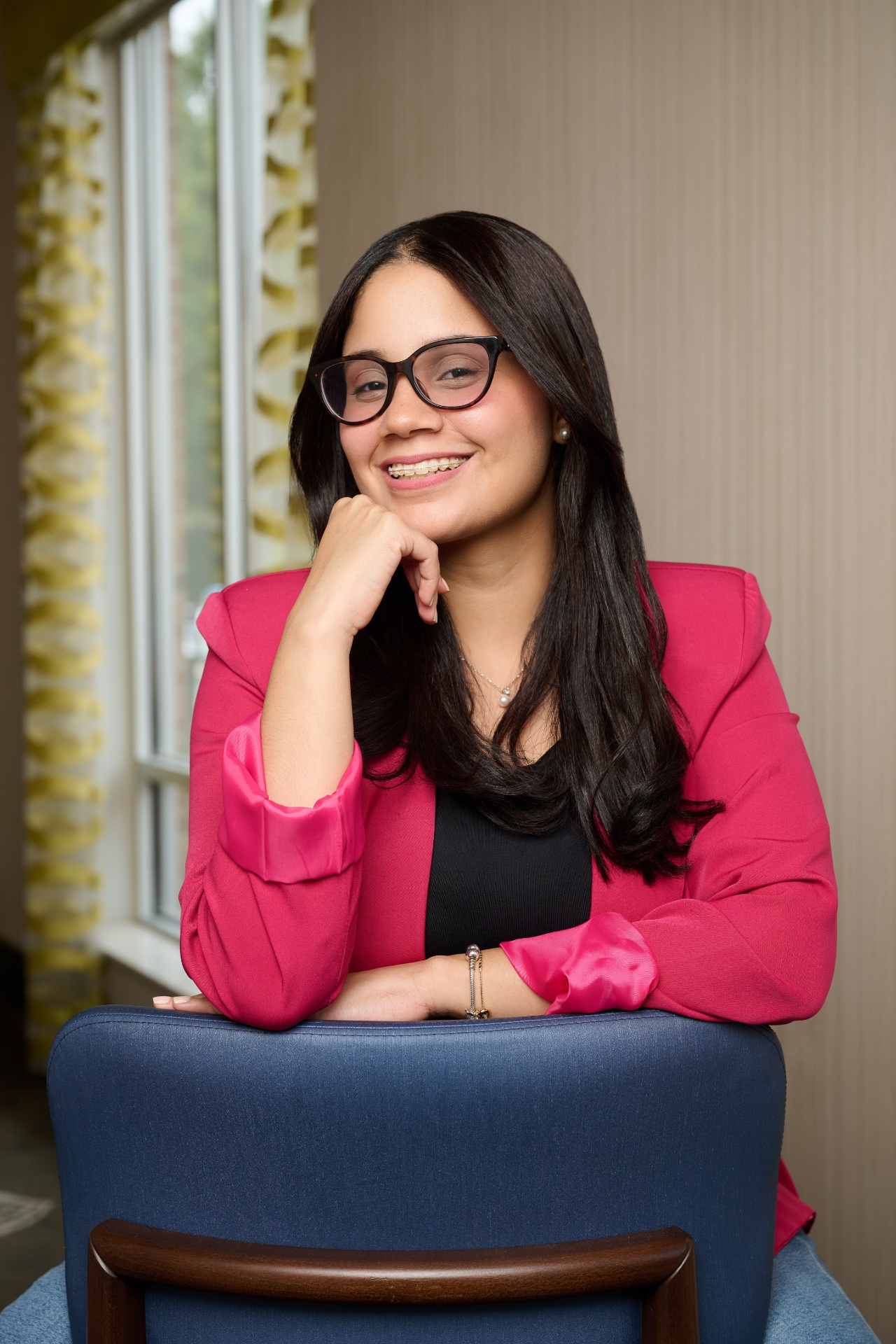 Portrait of Raymarie Guillen, Fractional CMO and Marketing Strategist
